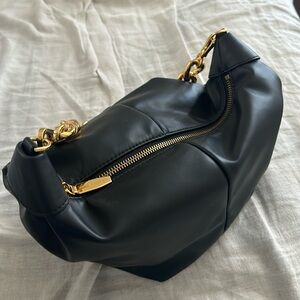 Charles and Keith black back